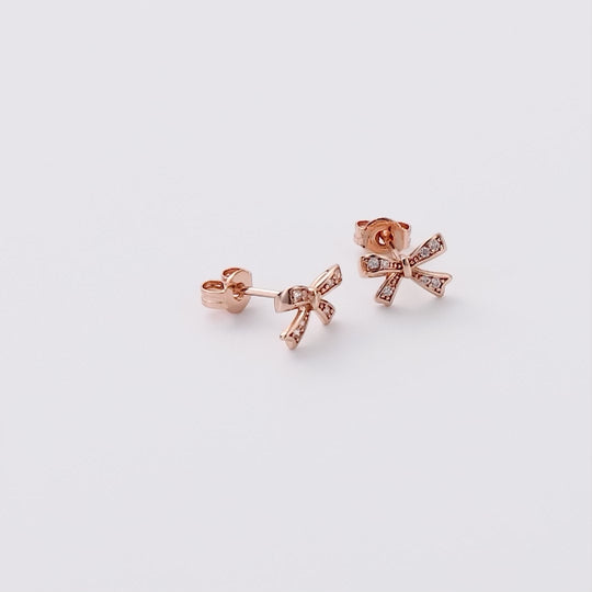 Rose Gold Plated Bow Earrings Created with Zircondia® Crystals