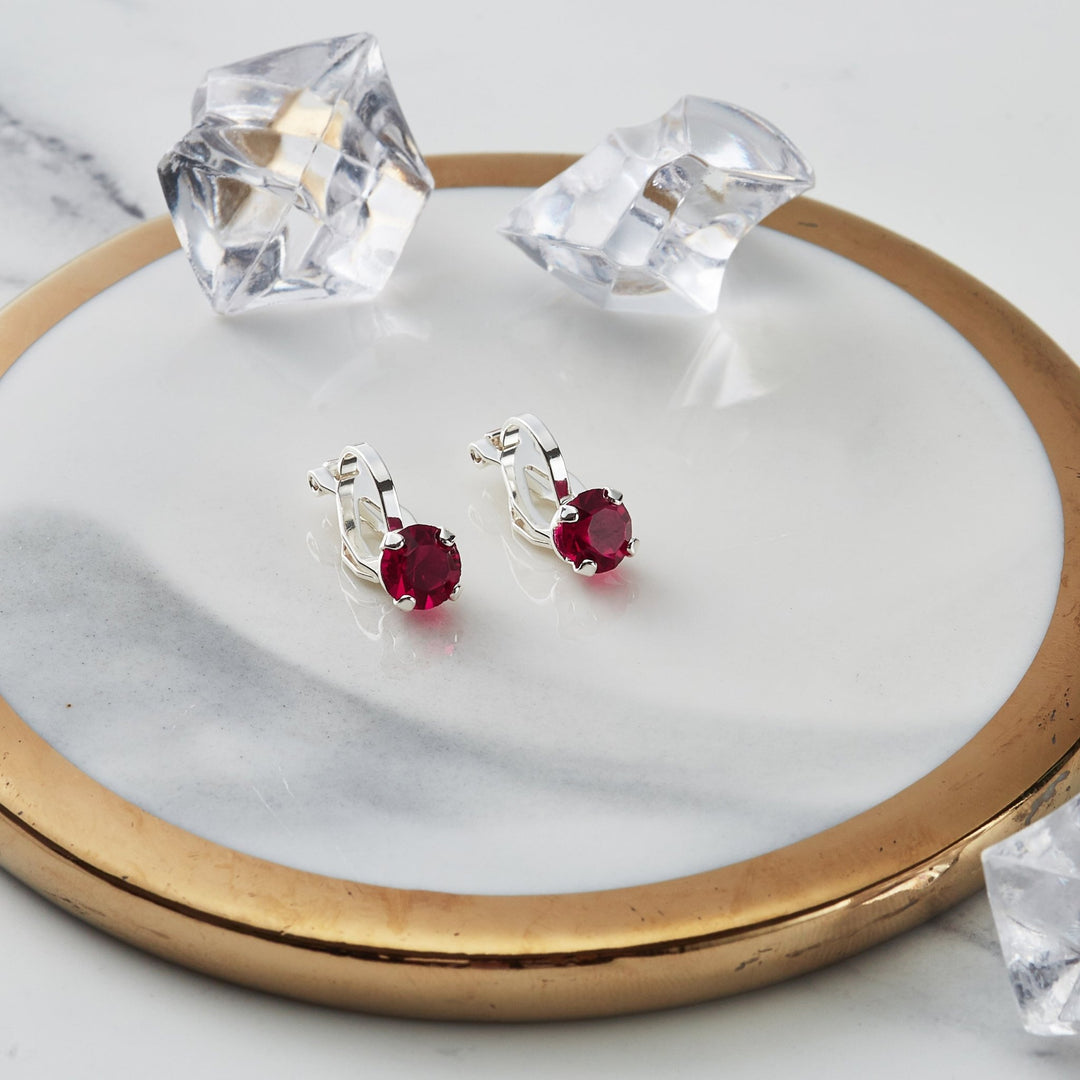 Red Crystal Clip On Earrings Created with Zircondia® Crystals - Philip Jones Jewellery