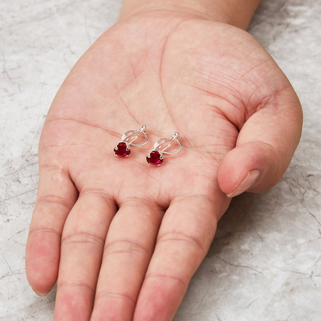 Red Crystal Clip On Earrings Created with Zircondia® Crystals - Philip Jones Jewellery