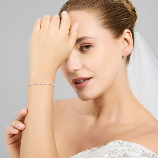 Rose Gold Plated 2mm Adjustable Tennis Bridal Bracelet Created with Zircondia® Crystals - Philip Jones Jewellery