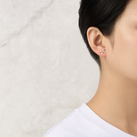 Rose Gold Plated Bow Earrings Created with Zircondia® Crystals - Philip Jones Jewellery