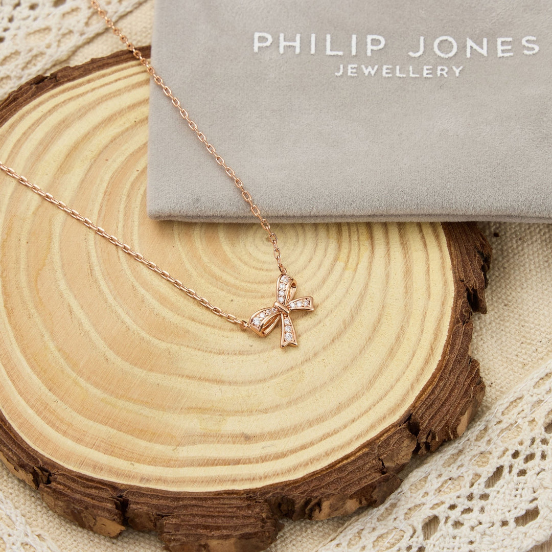 Rose Gold Plated Bow Necklace Created with Zircondia® Crystals - Philip Jones Jewellery