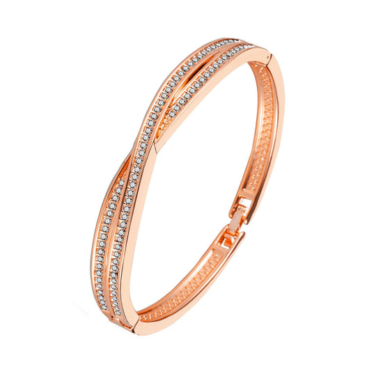 Rose Gold Plated Crossover Bangle Created with Zircondia® Crystals (7 Inch) - Philip Jones Jewellery