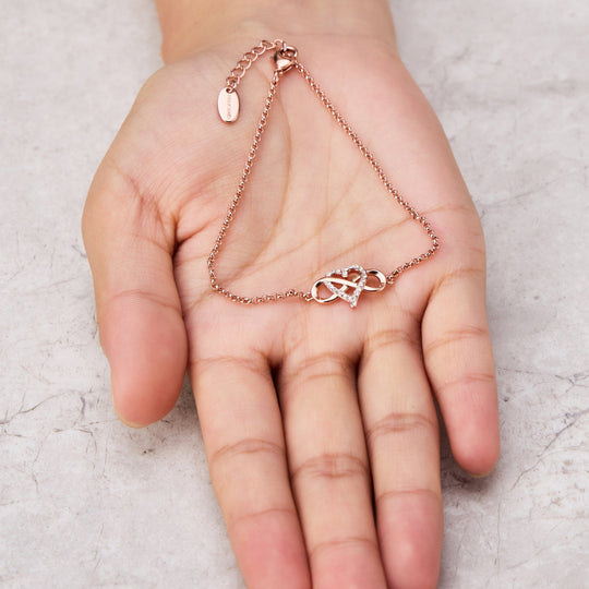 Rose Gold Plated Infinity Heart Bracelet Created with Zircondia® Crystals - Philip Jones Jewellery