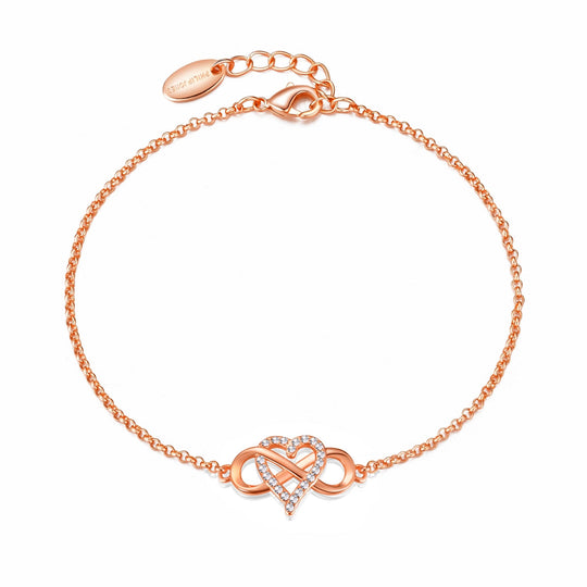 Rose Gold Plated Infinity Heart Bracelet Created with Zircondia® Crystals - Philip Jones Jewellery