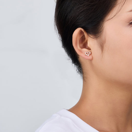 Rose Gold Plated Infinity Heart Stud Earrings Created with Zircondia® Crystals - Philip Jones Jewellery