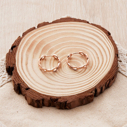 Rose Gold Plated Infinity Hoop Earrings Created with Zircondia® Crystals - Philip Jones Jewellery