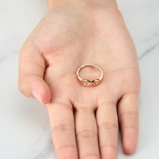 Rose Gold Plated Infinity Ring Created with Zircondia® Crystals - Philip Jones Jewellery