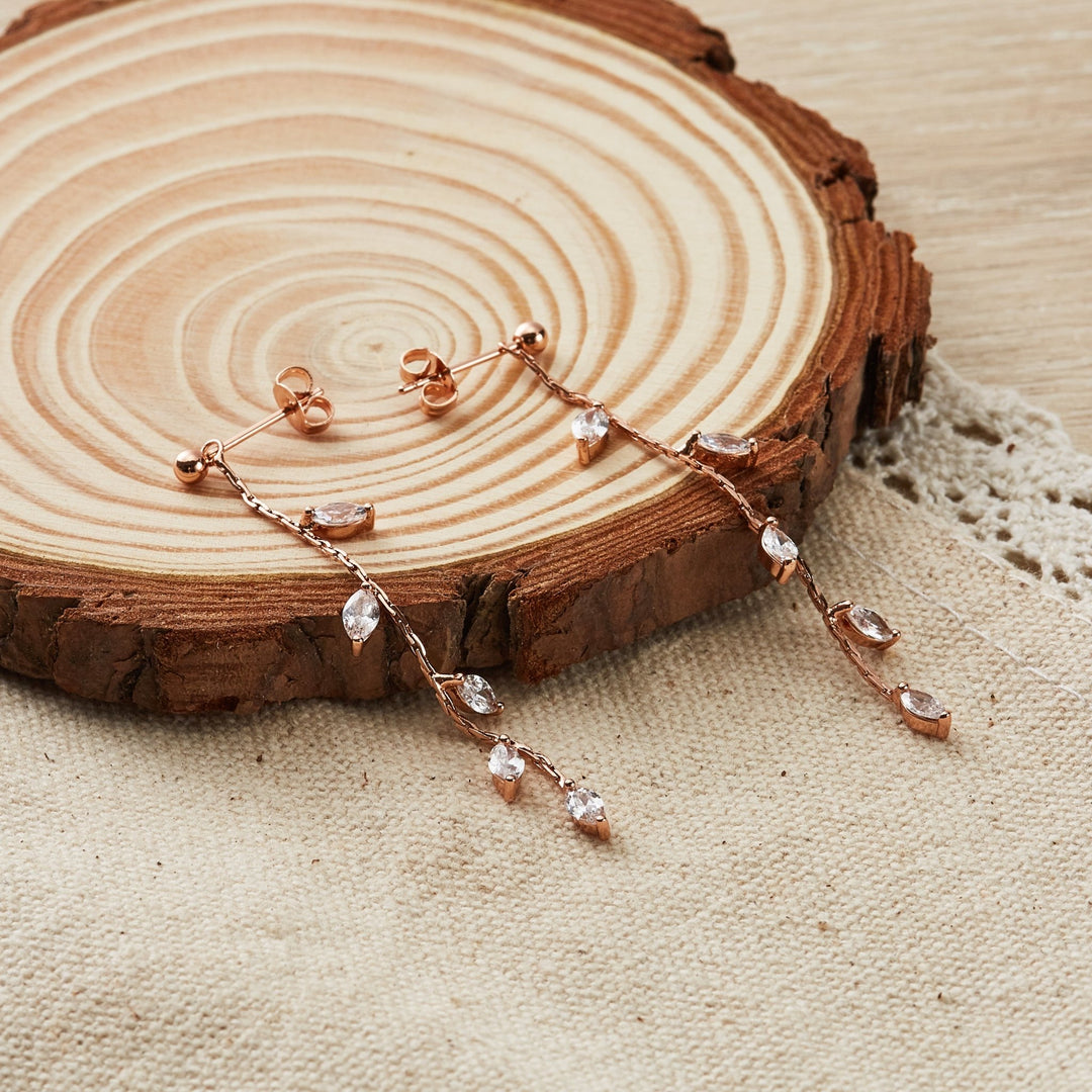 Rose Gold Plated Leaf Dangle Earrings Created with Zircondia® Crystals - Philip Jones Jewellery