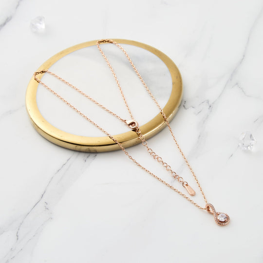 Rose Gold Plated Solitaire Twist Necklace Created with Zircondia® Crystals - Philip Jones Jewellery