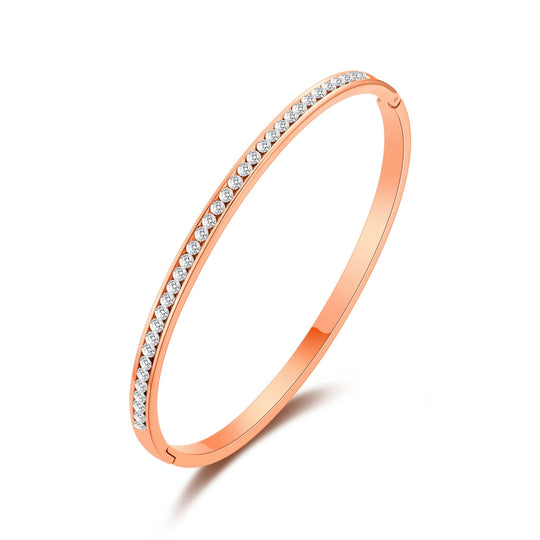 Rose Gold Plated Stainless Steel Channel Set Bangle Created with Zircondia® Crystals (7 Inch) - Philip Jones Jewellery