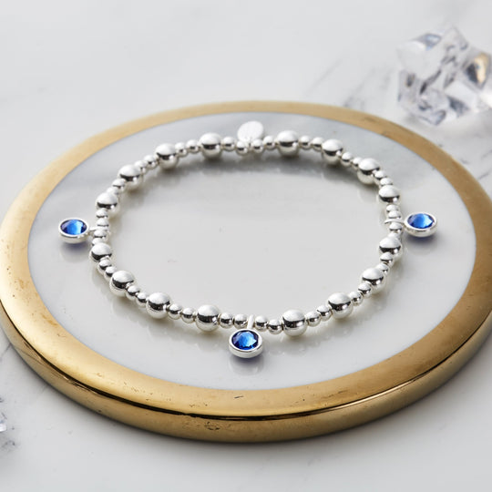 September (Sapphire) Birthstone Stretch Charm Bracelet with Quote Gift Box - Philip Jones Jewellery