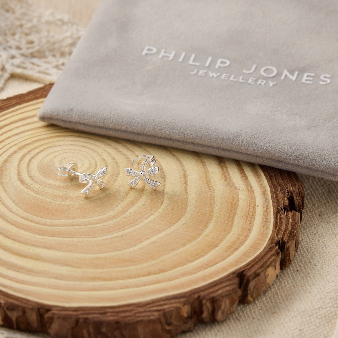 Silver Plated Bow Earrings Created with Zircondia® Crystals - Philip Jones Jewellery