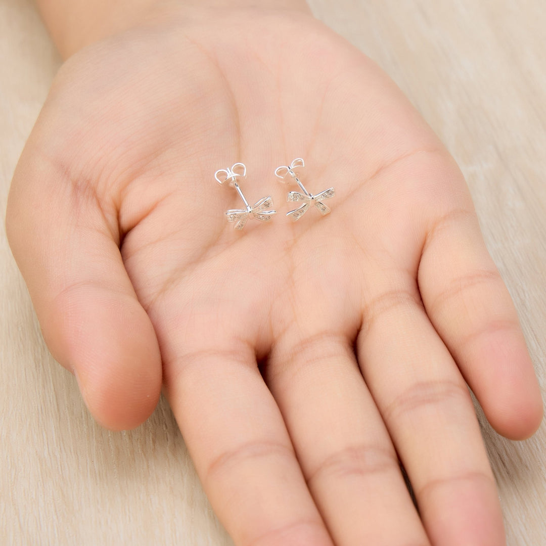 Silver Plated Bow Earrings Created with Zircondia® Crystals - Philip Jones Jewellery