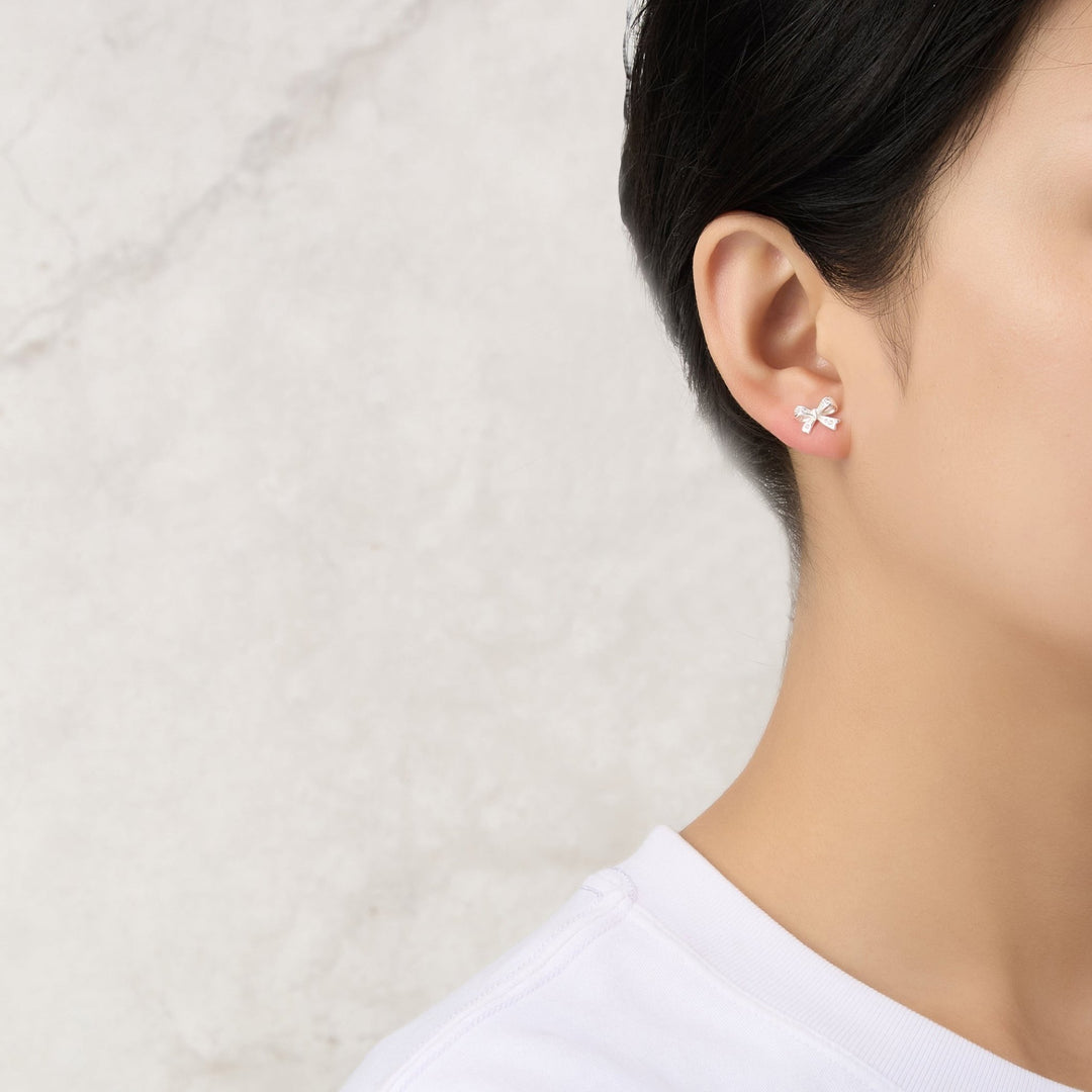 Silver Plated Bow Earrings Created with Zircondia® Crystals - Philip Jones Jewellery