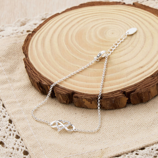 Silver Plated Infinity Heart Bracelet Created with Zircondia® Crystals - Philip Jones Jewellery