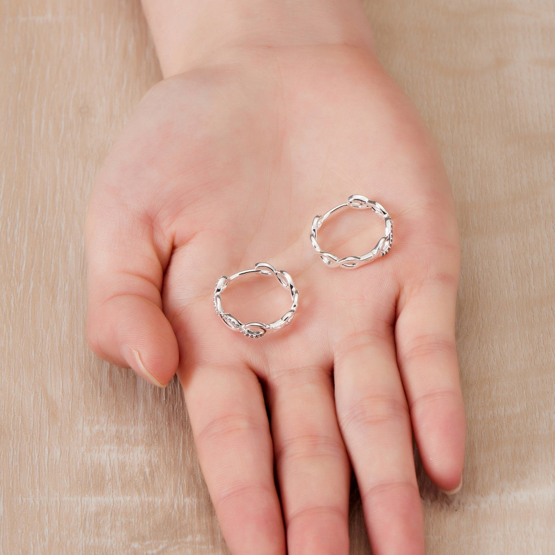 Silver Plated Infinity Hoop Earrings Created with Zircondia® Crystals - Philip Jones Jewellery