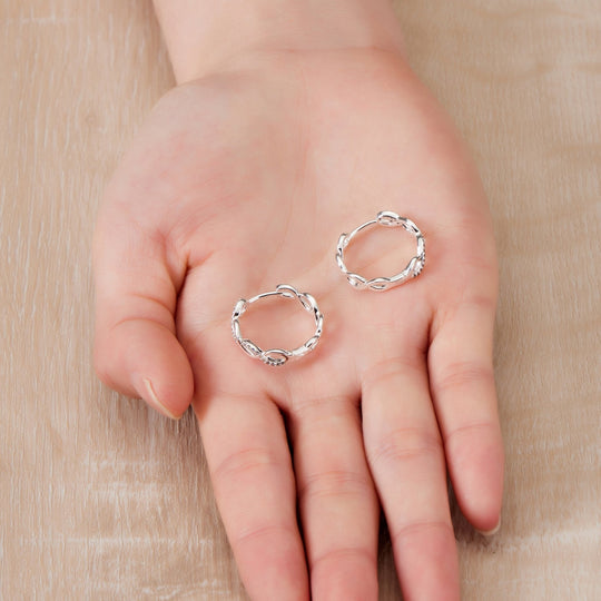 Silver Plated Infinity Hoop Earrings Created with Zircondia® Crystals - Philip Jones Jewellery