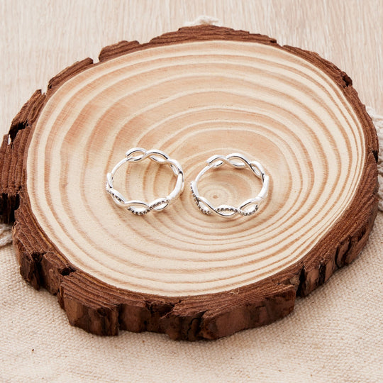 Silver Plated Infinity Hoop Earrings Created with Zircondia® Crystals - Philip Jones Jewellery