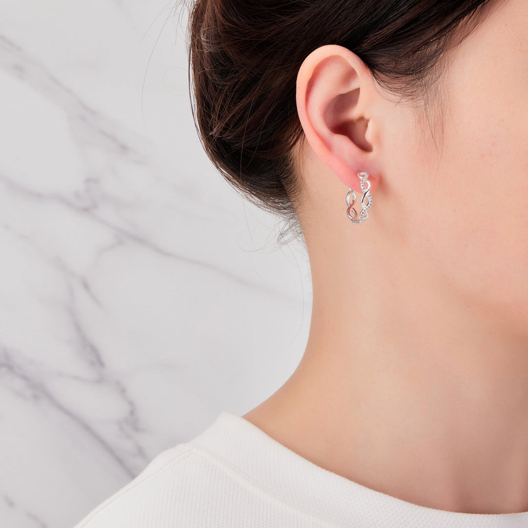 Silver Plated Infinity Hoop Earrings Created with Zircondia® Crystals - Philip Jones Jewellery