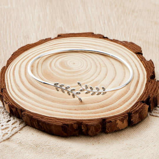 Silver Plated Leaf Bangle Created with Zircondia® Crystals - Philip Jones Jewellery