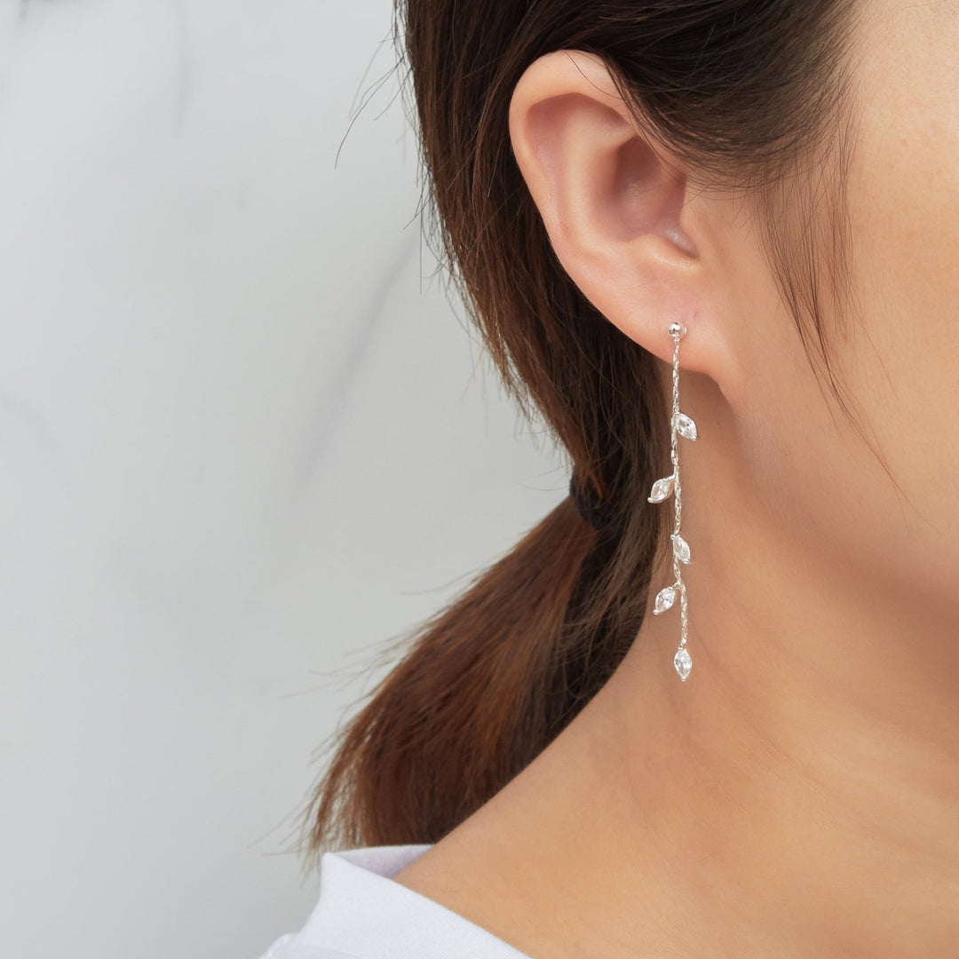 Silver Plated Leaf Dangle Earrings Created with Zircondia® Crystals - Philip Jones Jewellery