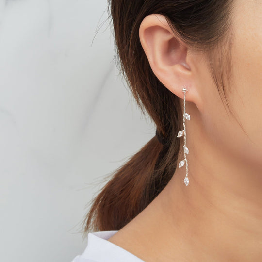 Silver Plated Leaf Dangle Earrings Created with Zircondia® Crystals - Philip Jones Jewellery