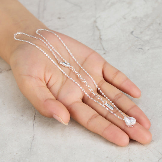 Silver Plated Pear Halo Necklace Created with Zircondia® Crystals - Philip Jones Jewellery
