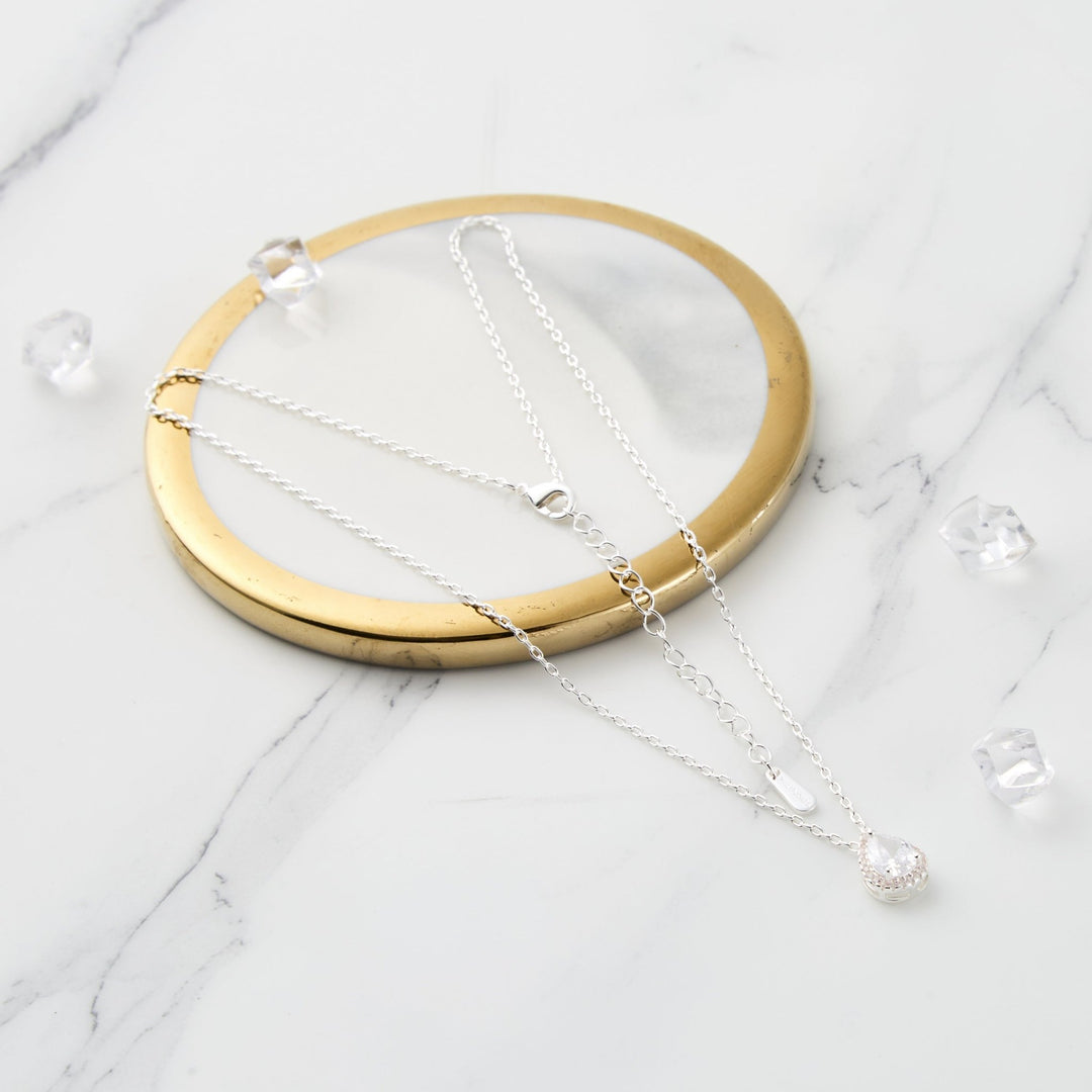 Silver Plated Pear Halo Necklace Created with Zircondia® Crystals - Philip Jones Jewellery
