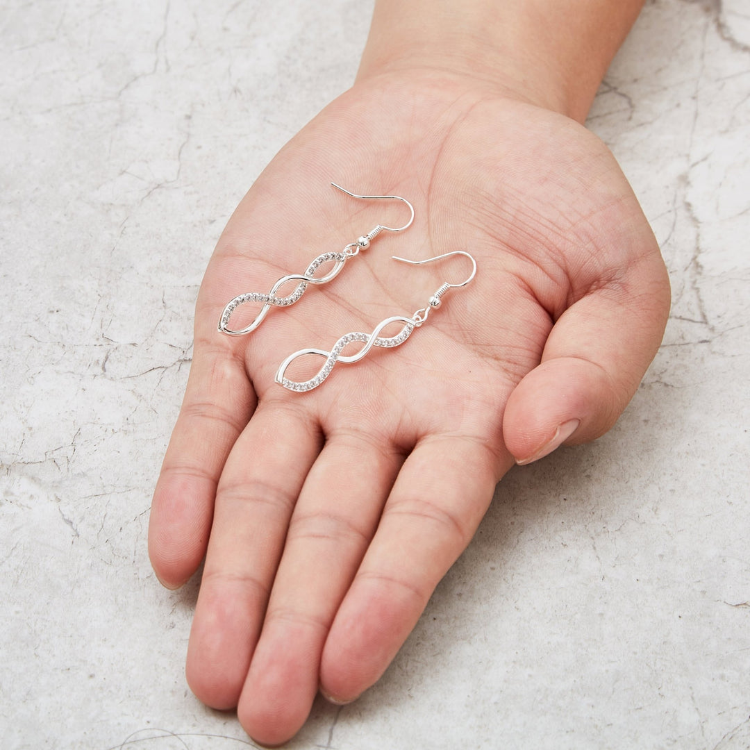 Silver Plated Twist Drop Earrings Created with Zircondia® Crystals - Philip Jones Jewellery