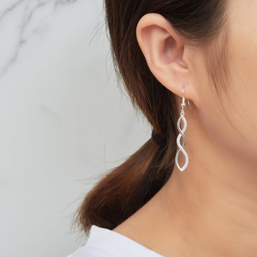 Silver Plated Twist Drop Earrings Created with Zircondia® Crystals - Philip Jones Jewellery