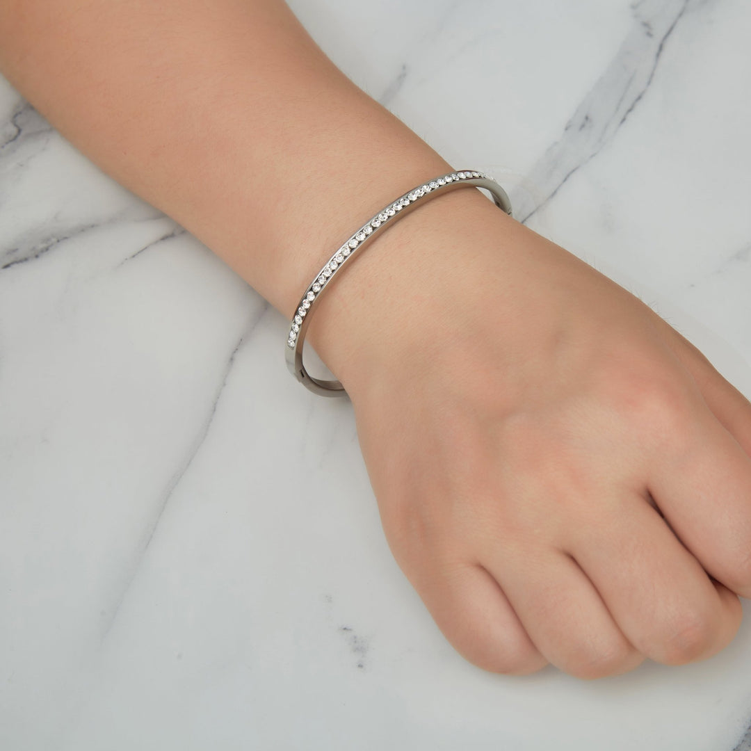 Stainless Steel Channel Set Bangle Created with Zircondia® Crystals (7 Inch) - Philip Jones Jewellery