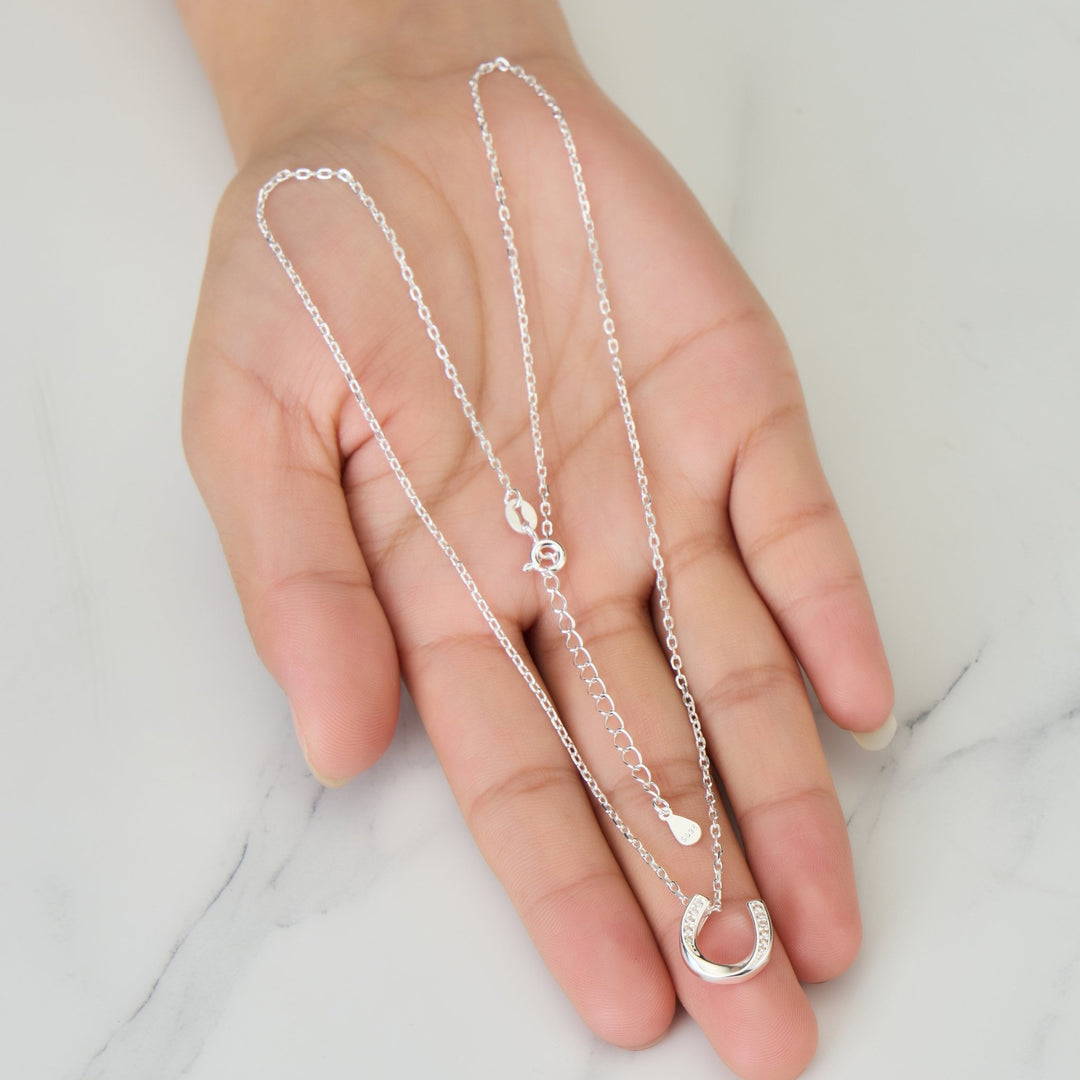 Sterling Silver Horseshoe Necklace Created with Zircondia® Crystals - Philip Jones Jewellery