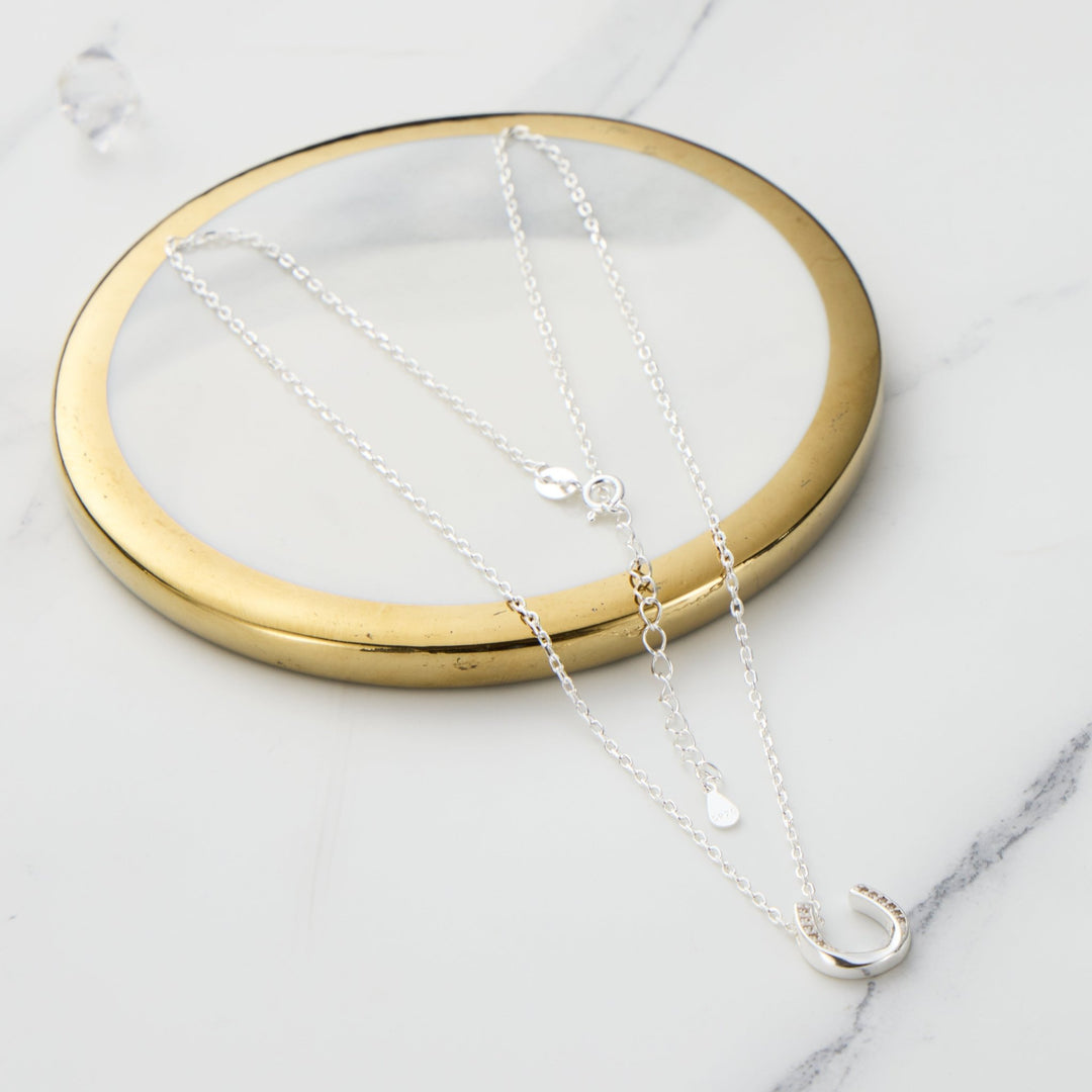 Sterling Silver Horseshoe Necklace Created with Zircondia® Crystals - Philip Jones Jewellery