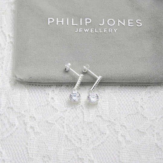 Sterling Silver Solitaire Drop Bridal Earrings Created with Zircondia® Crystals - Philip Jones Jewellery