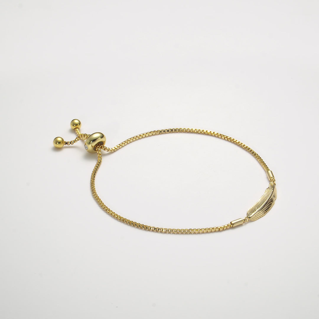 Gold Plated Feather Friendship Bracelet Created with Zircondia® Crystals Video