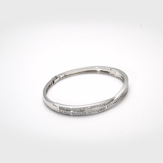 Silver Plated Crossover Bangle Created with Zircondia® Crystals Video