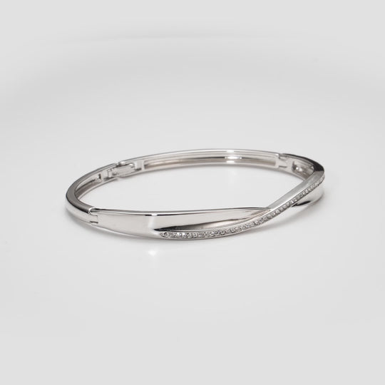Silver Plated Arc Bangle Created with Zircondia® Crystals Video