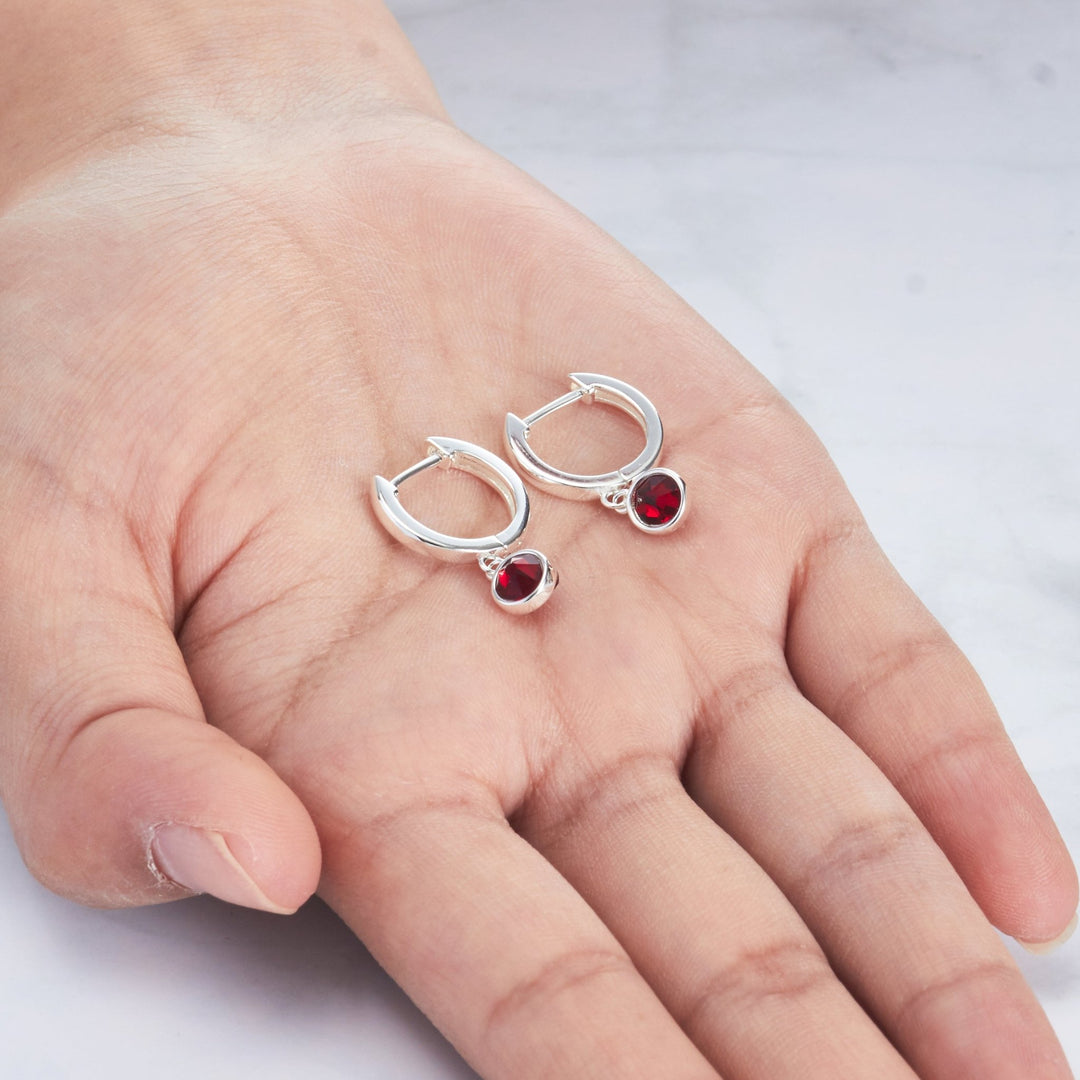 Dark Red Crystal Hoop Earrings Created with Zircondia® Crystals - Philip Jones Jewellery