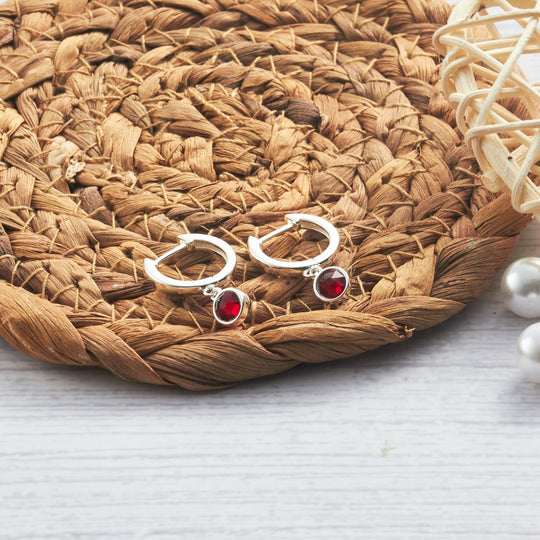 Dark Red Crystal Hoop Earrings Created with Zircondia® Crystals - Philip Jones Jewellery