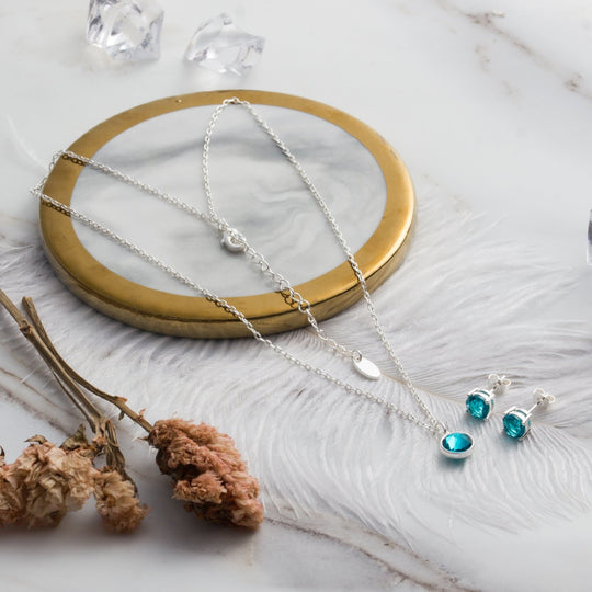 December (Blue Topaz) Birthstone Necklace & Earrings Set Created with Zircondia® Crystals - Philip Jones Jewellery
