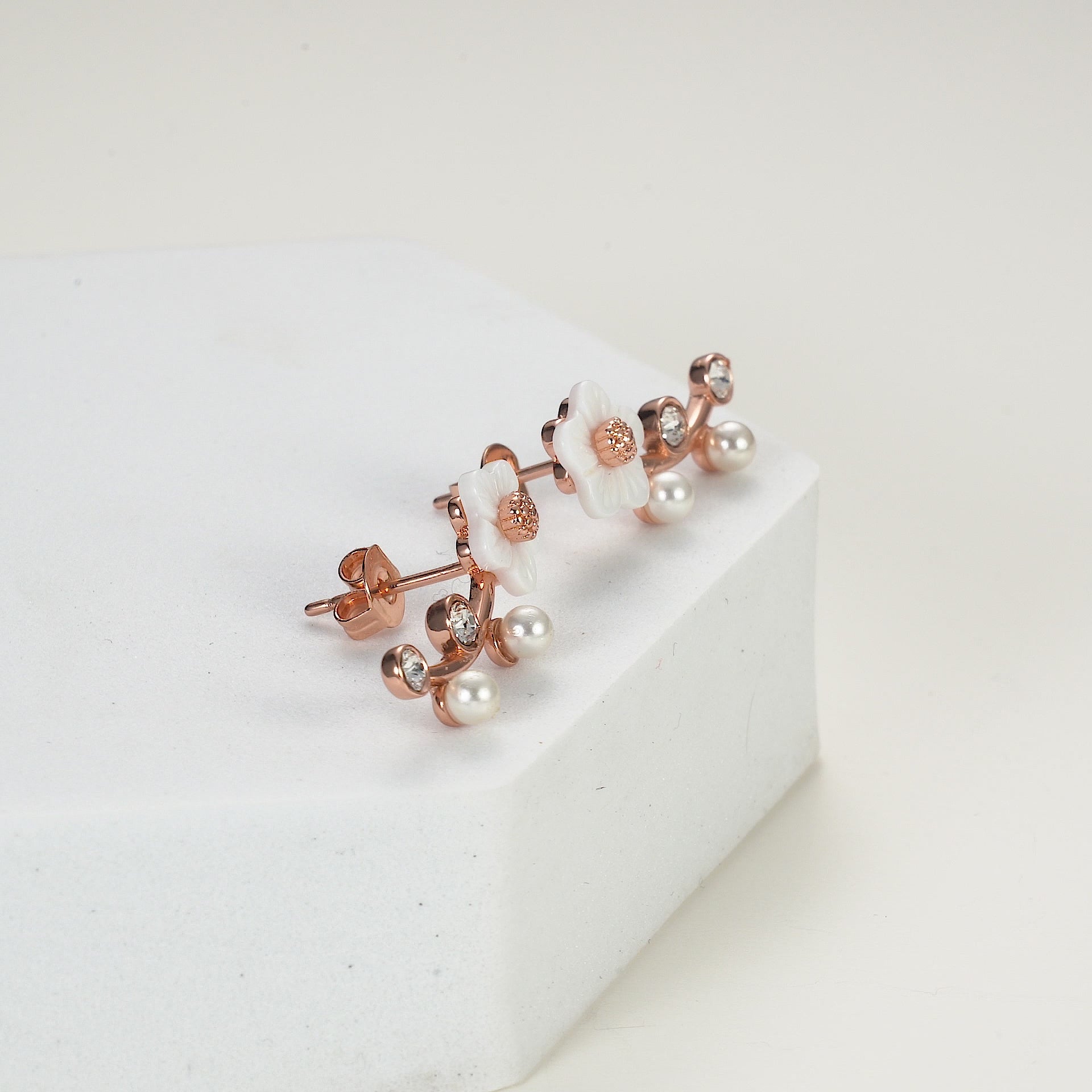 Rose Gold Plated Daisy Climber Earrings Created with Zircondia® Crystals Video