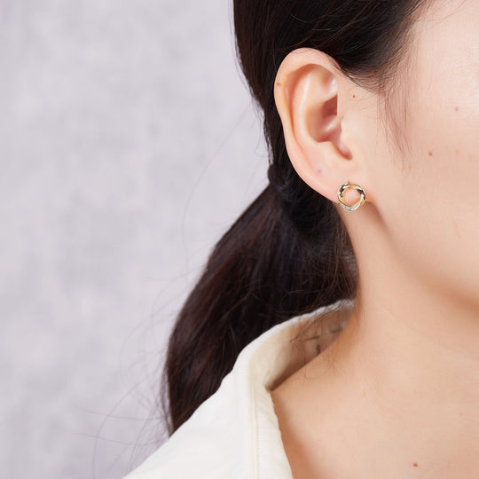 Gold Plated Circle Twist Earrings Created with Zircondia® Crystals - Philip Jones Jewellery
