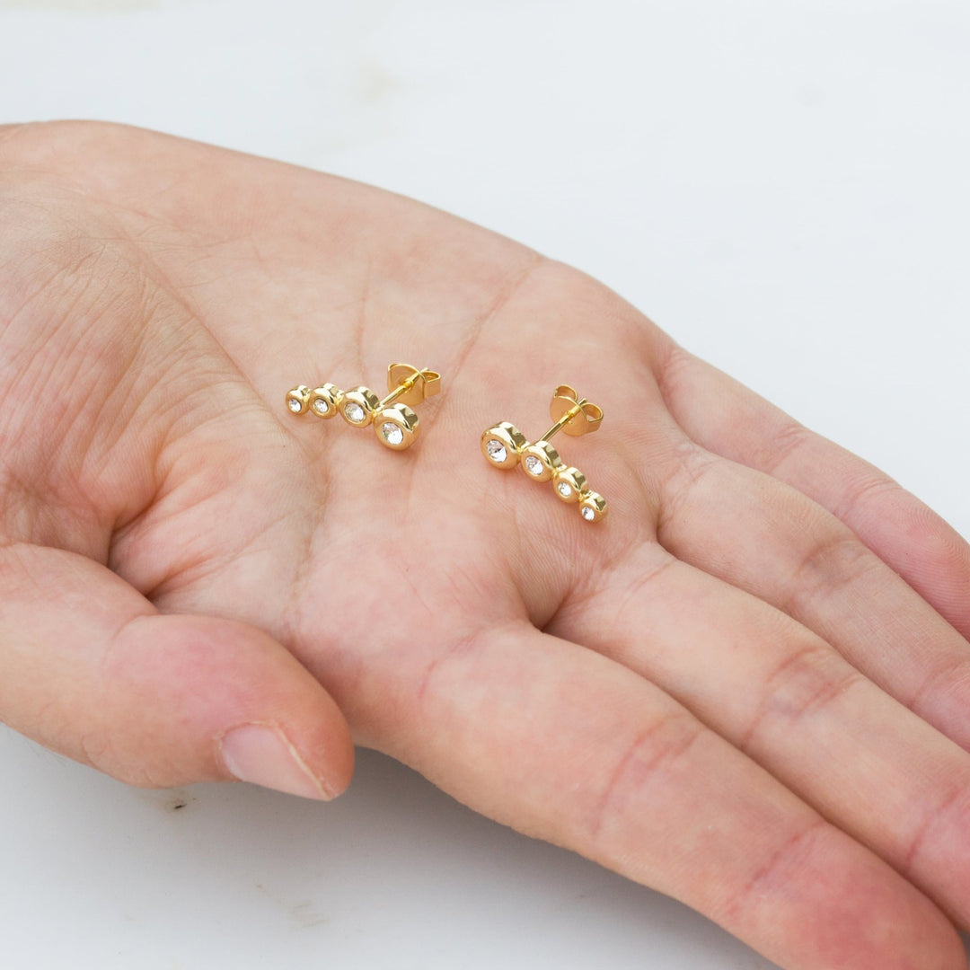 Gold Plated Four Stone Climber Earrings Created With Zircondia® Crystals - Philip Jones Jewellery