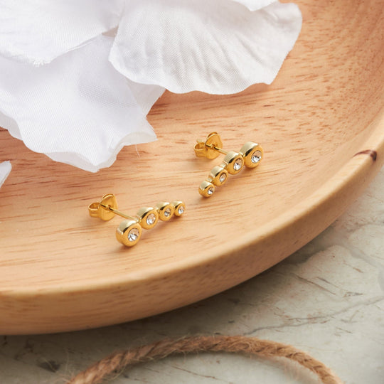 Gold Plated Four Stone Climber Earrings Created With Zircondia® Crystals - Philip Jones Jewellery