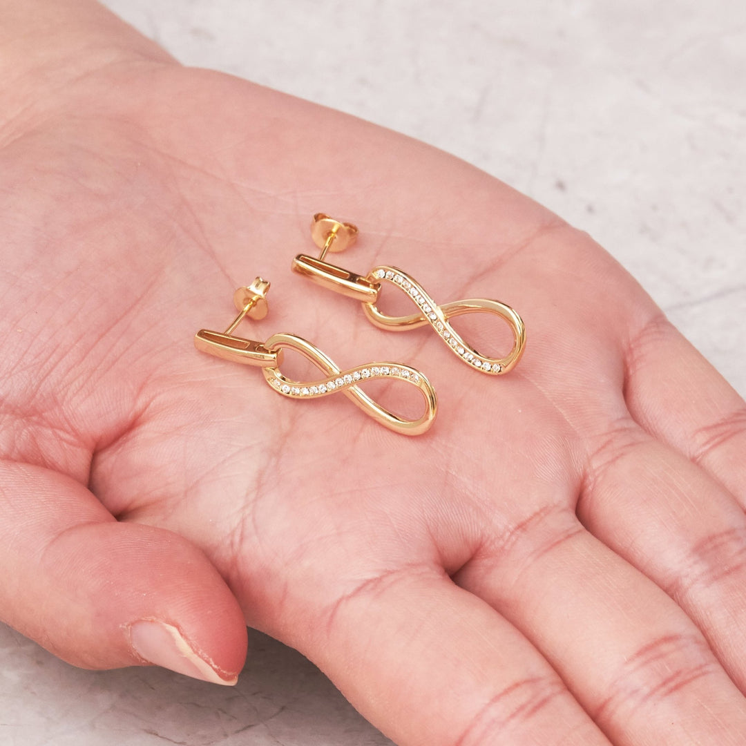 Gold Plated Infinity Drop Earrings Created with Zircondia® Crystals - Philip Jones Jewellery