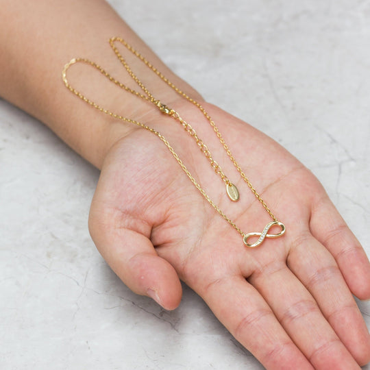 Gold Plated Infinity Pendant Necklace Created with Zircondia® Crystals - Philip Jones Jewellery
