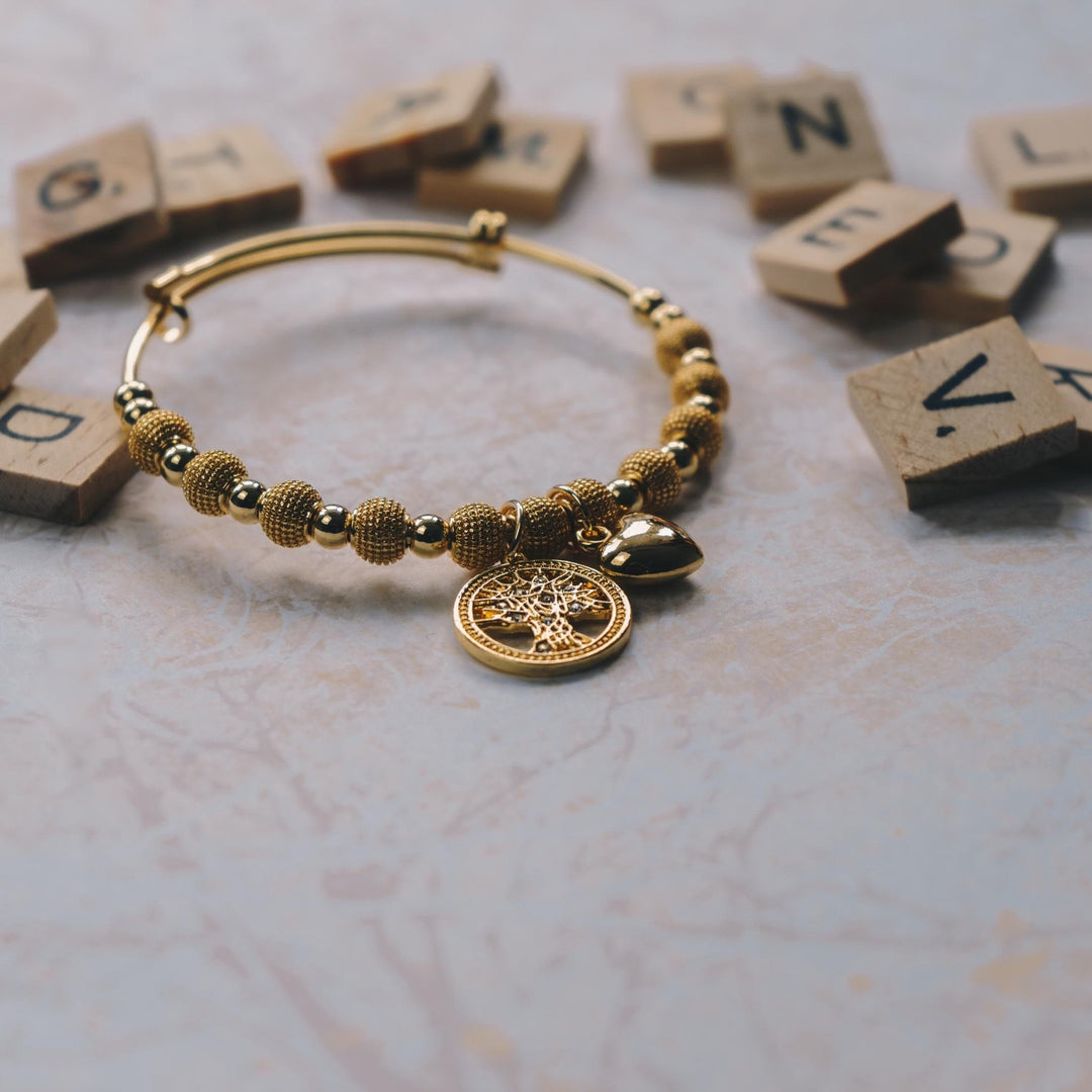 Gold Plated Tree of Life Bangle Created with Zircondia® Crystals - Philip Jones Jewellery