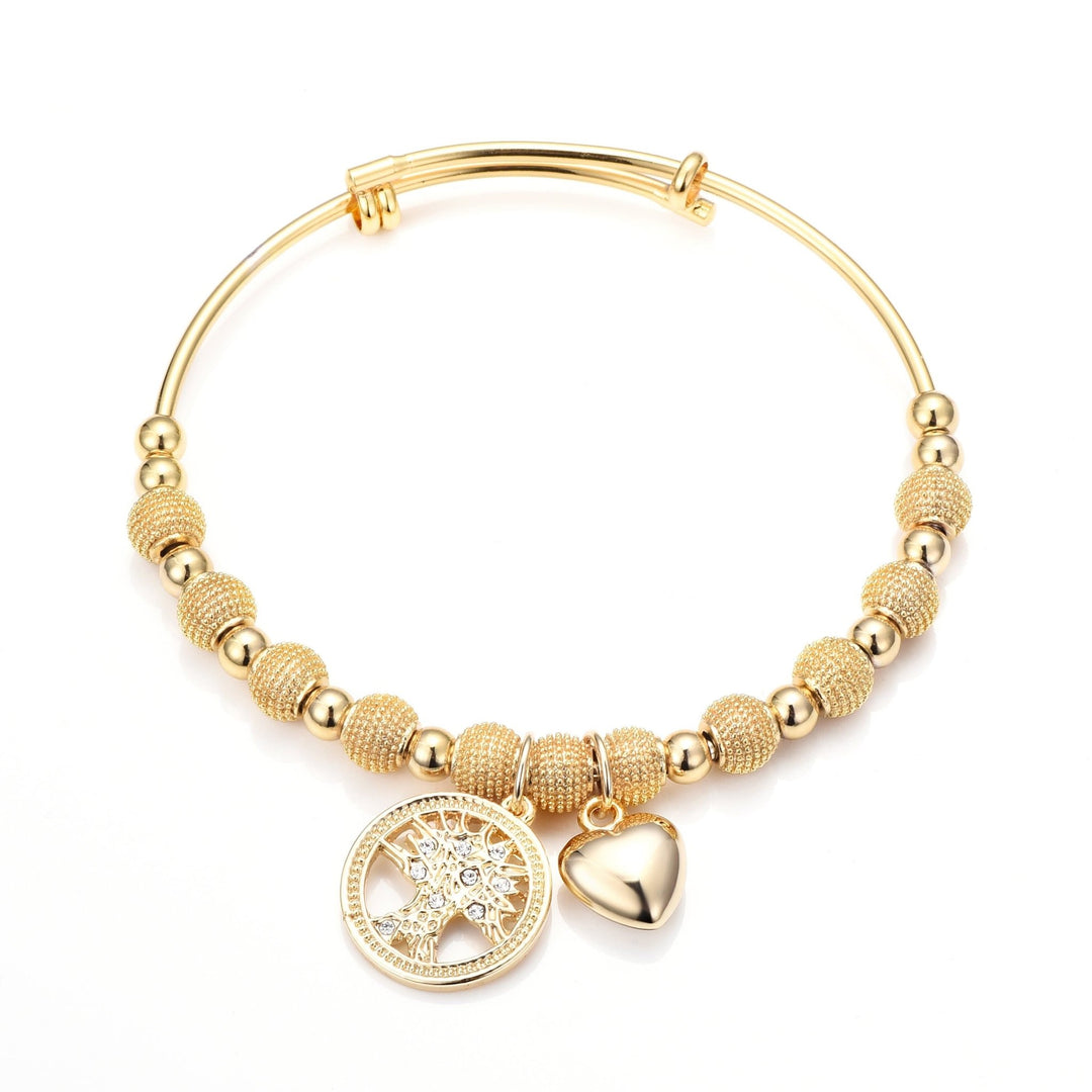 Gold Plated Tree of Life Bangle Created with Zircondia® Crystals - Philip Jones Jewellery