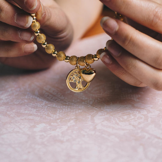 Gold Plated Tree of Life Bangle Created with Zircondia® Crystals - Philip Jones Jewellery